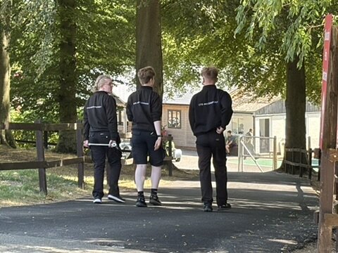 Joshua Worrall walking to the pits with the CTS Motorsport crew at Cadwell Park